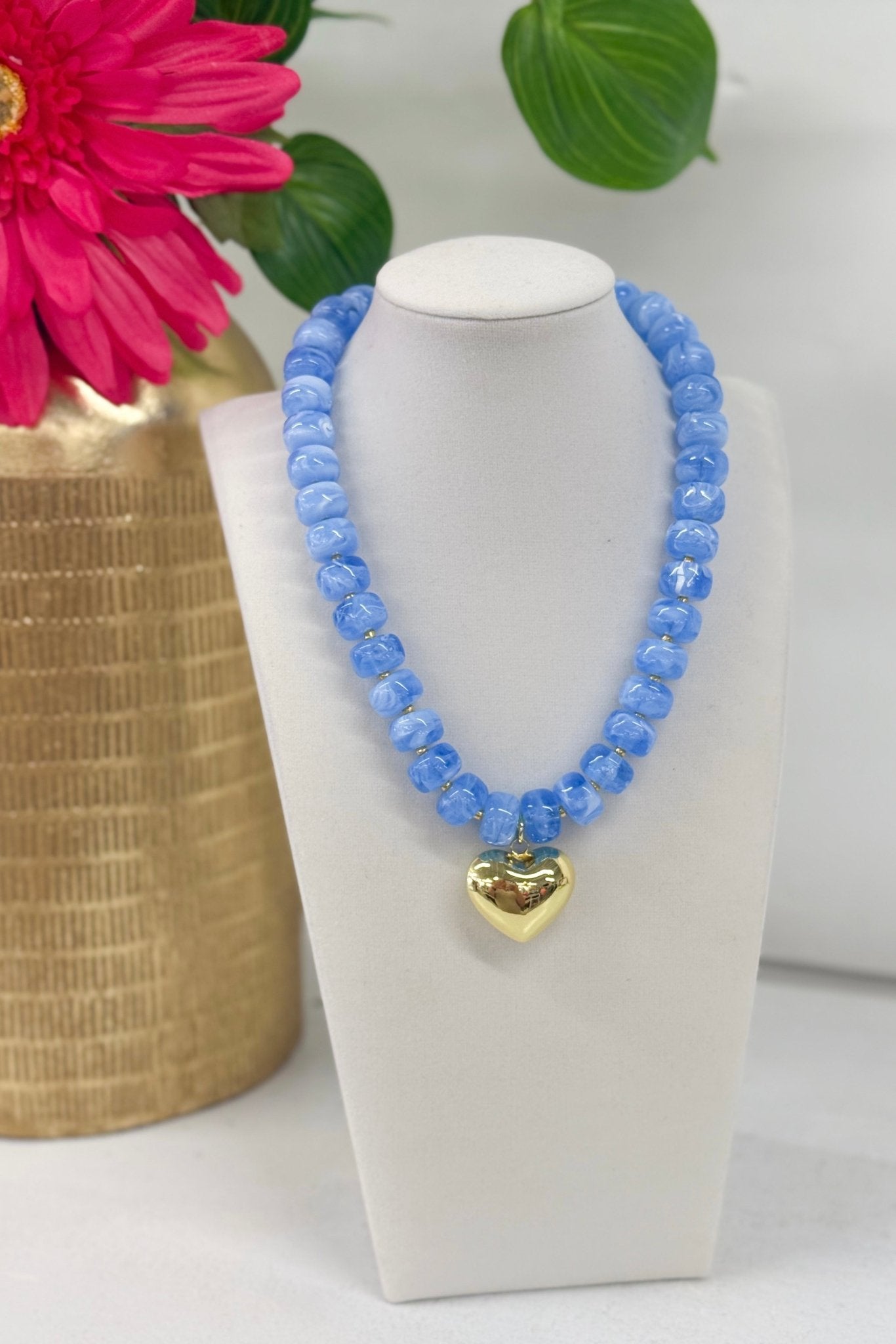 Marble bead necklace finished with a heart drop
