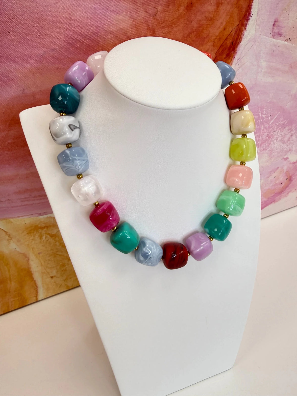 Square marbled beads strung into a colorful necklace