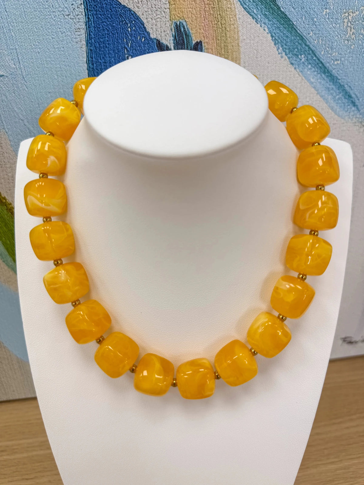 Square bead necklace with a swirled marble finish
