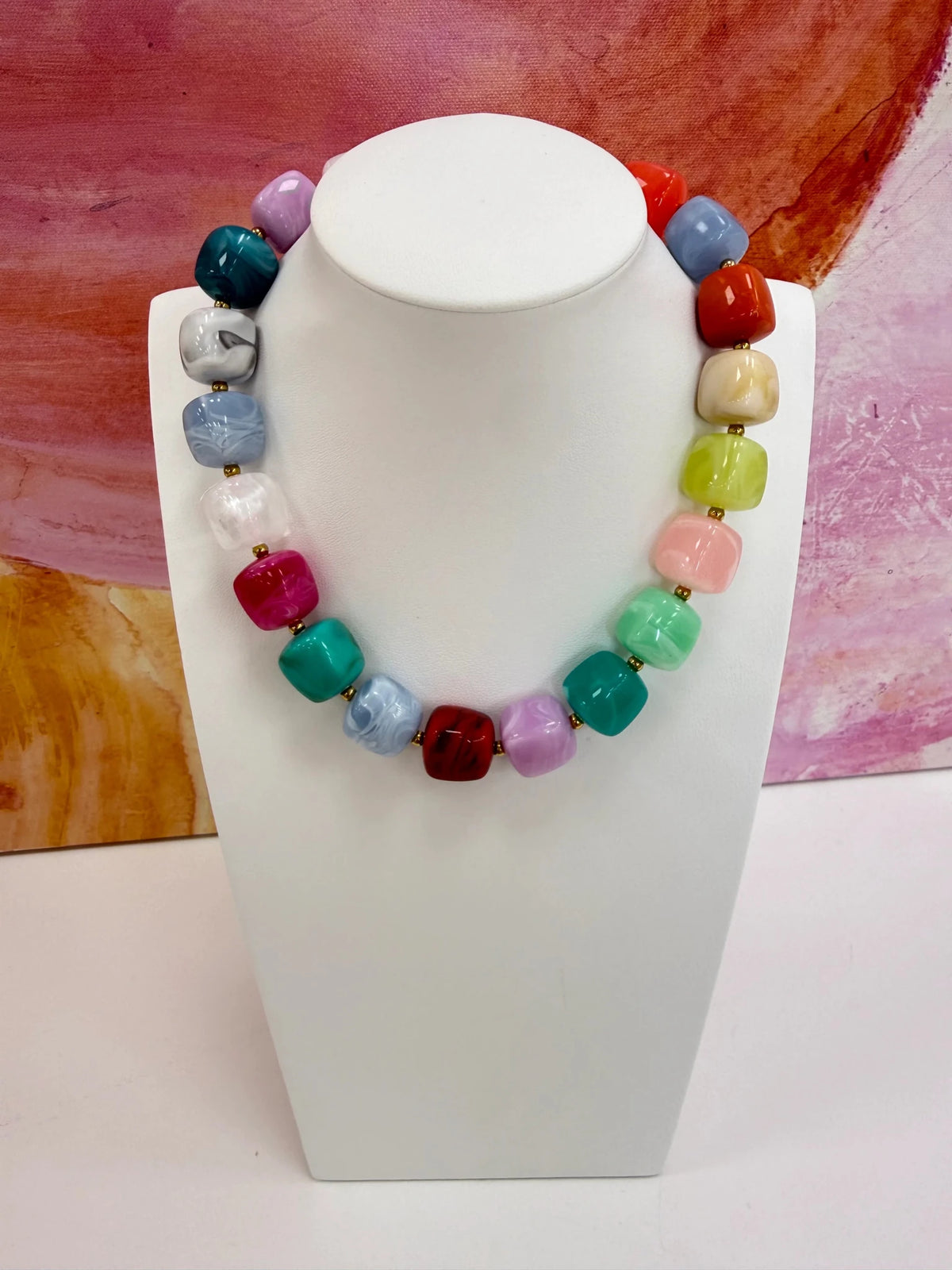 Necklace of squared beads with a marbled swirl