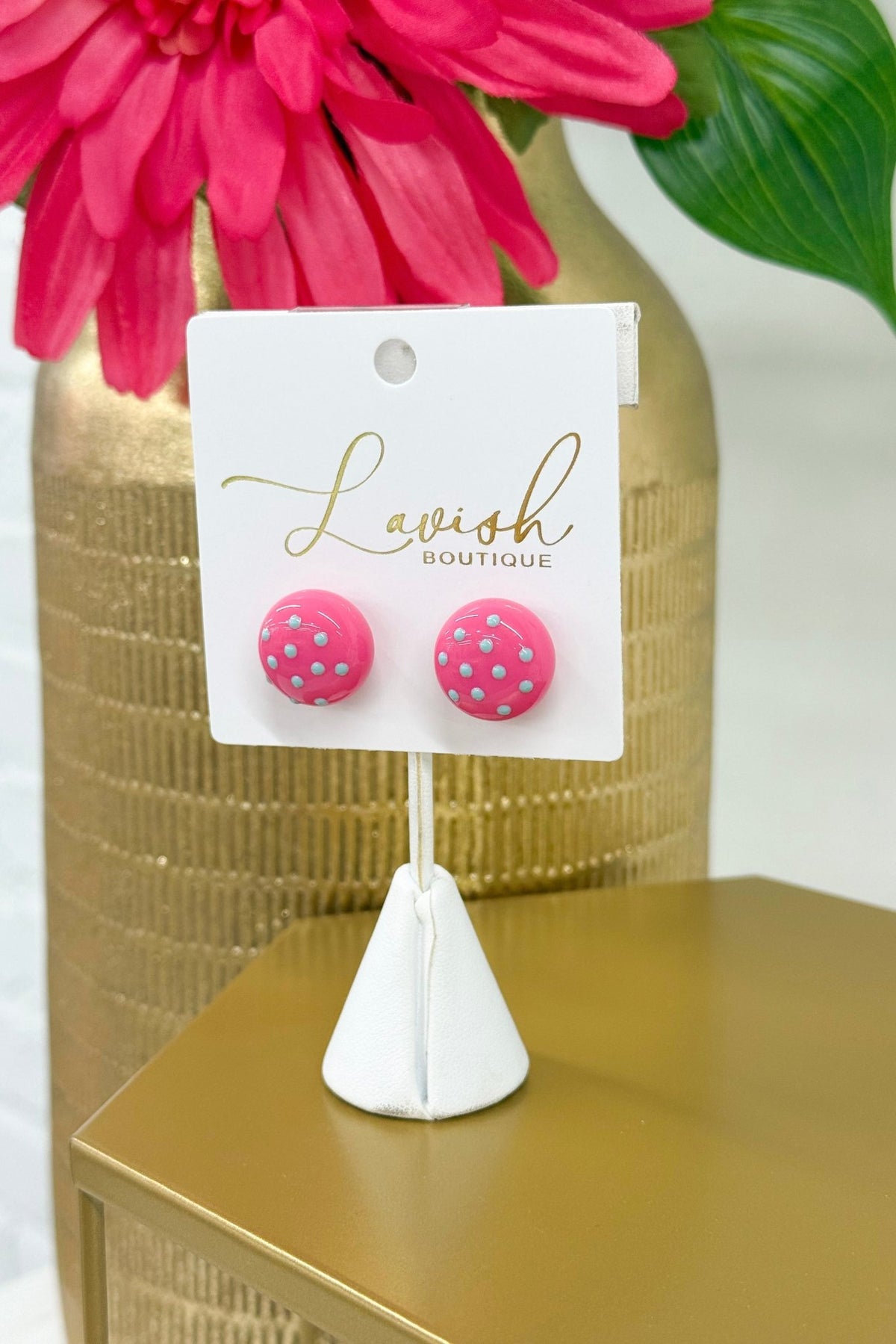 Round stud earrings with pink and blue dots