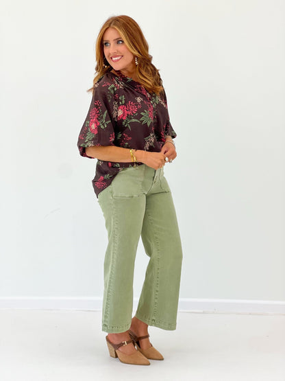 Brown top with an allover floral pattern
