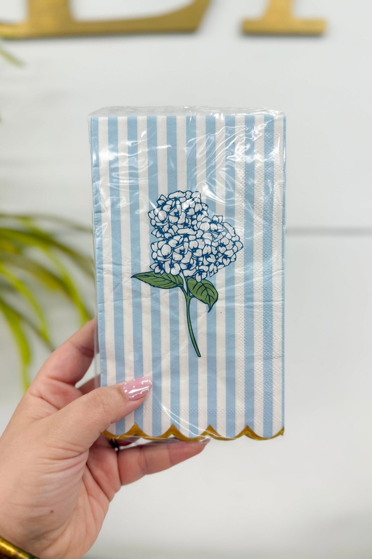 Pack of paper guest towels with a hydrangea stem print