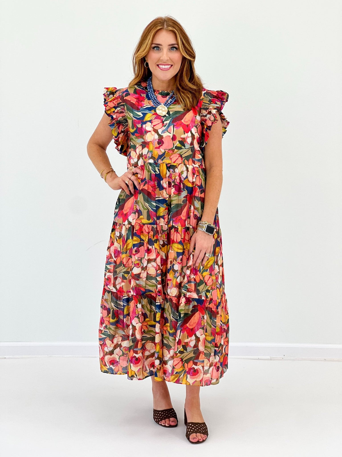 Allover multi floral print on a flutter sleeve dress
