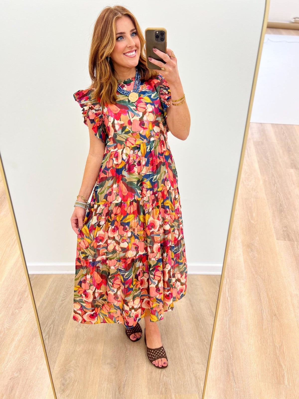 Flutter sleeve dress in a multi floral print