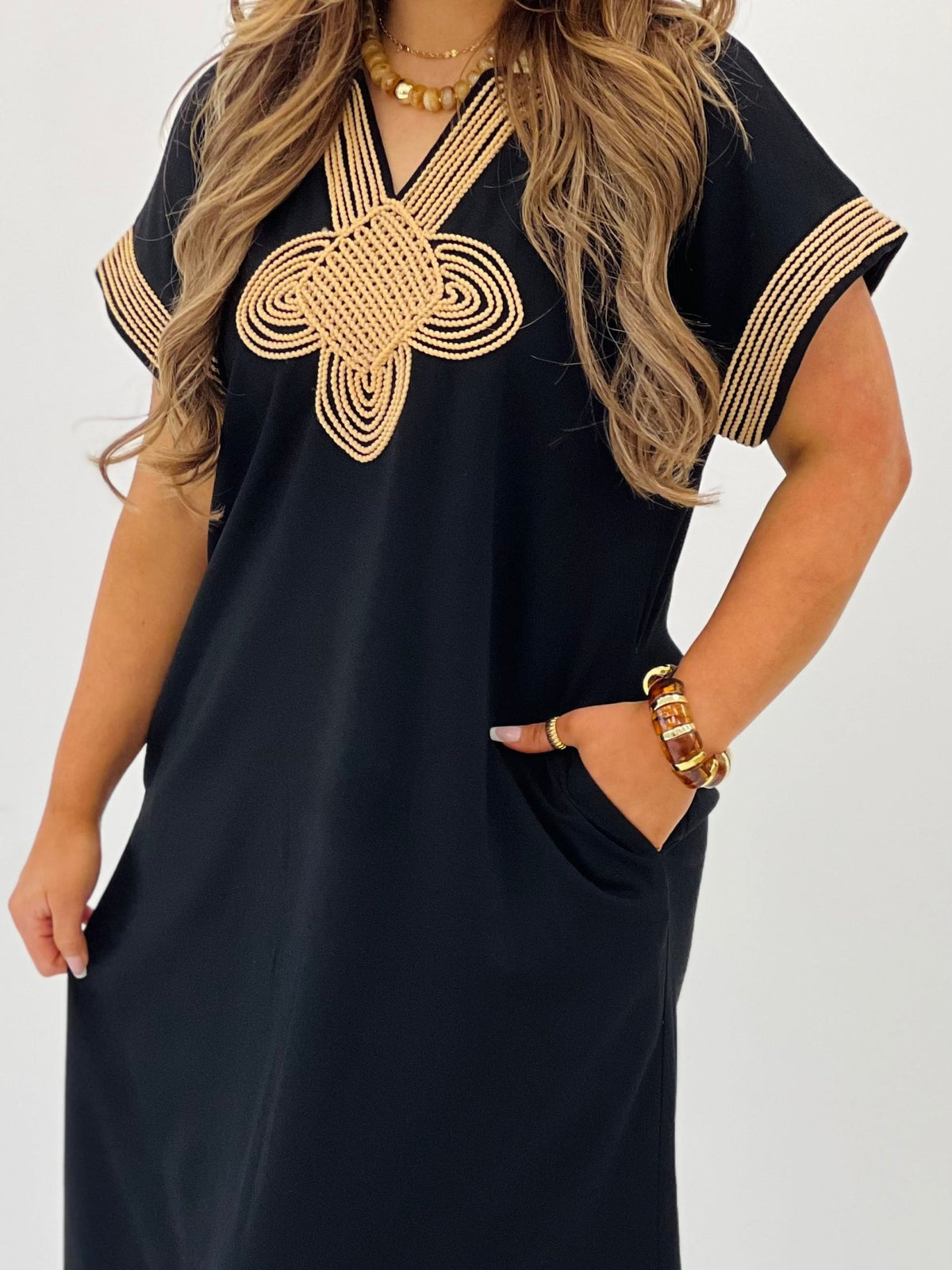 Black embroidered midi dress with a smooth drape