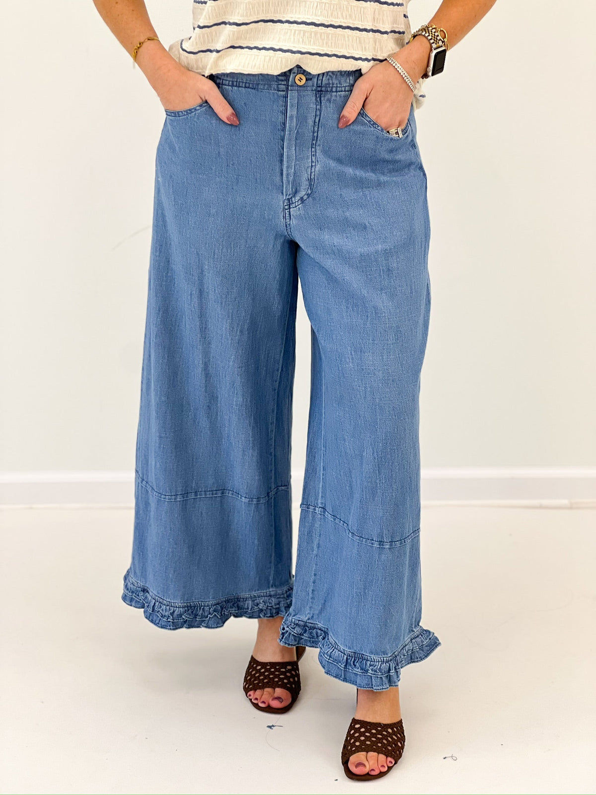 Denim wide leg pants with a ruffled hem