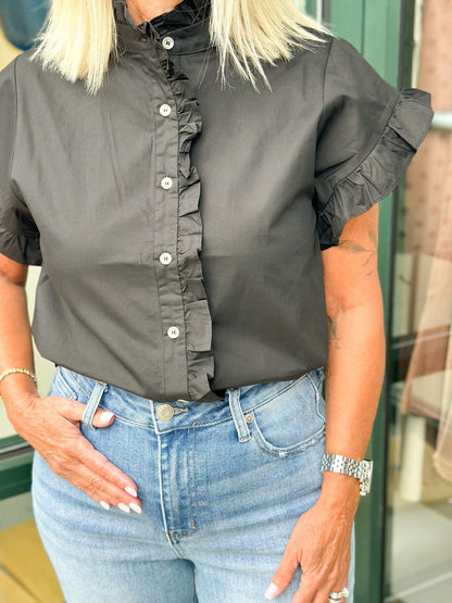 Black blouse with frilled sleeves and buttons