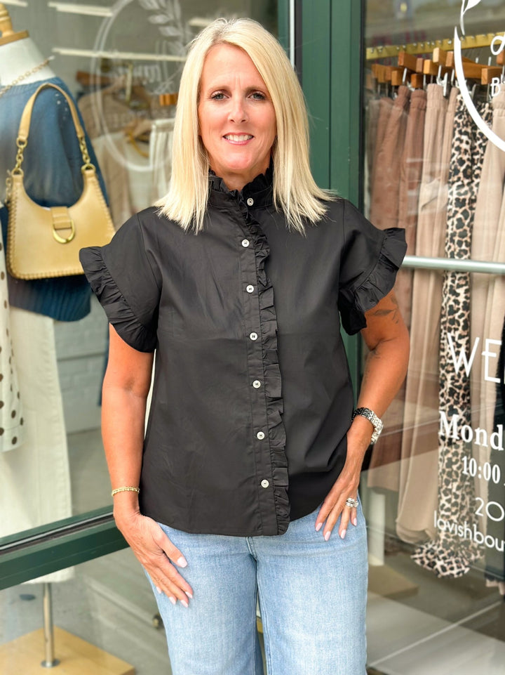Black button up top with ruffled sleeves