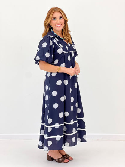 Smocking detail on a midi length dress