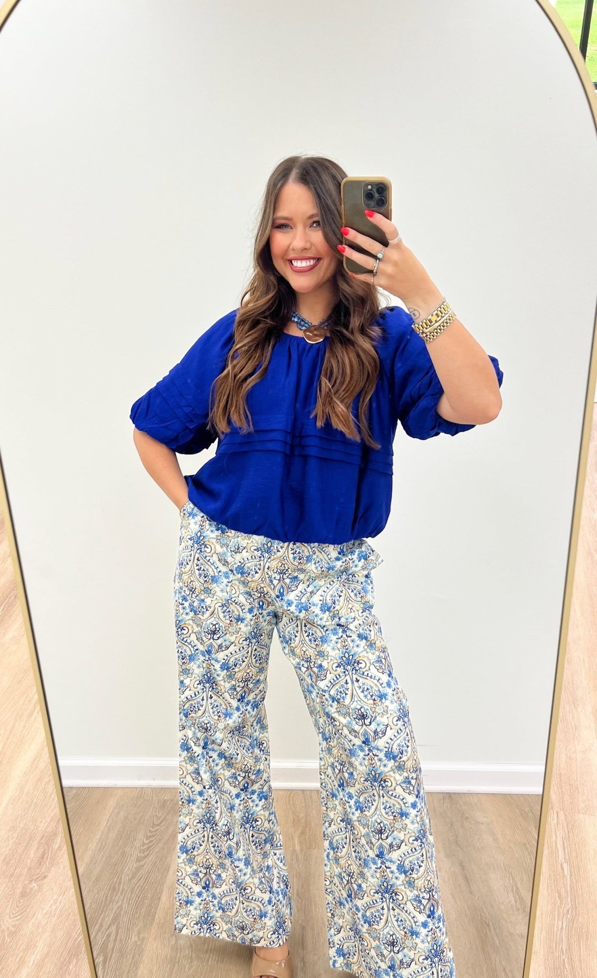 Structured royal blue top with a defined shoulder