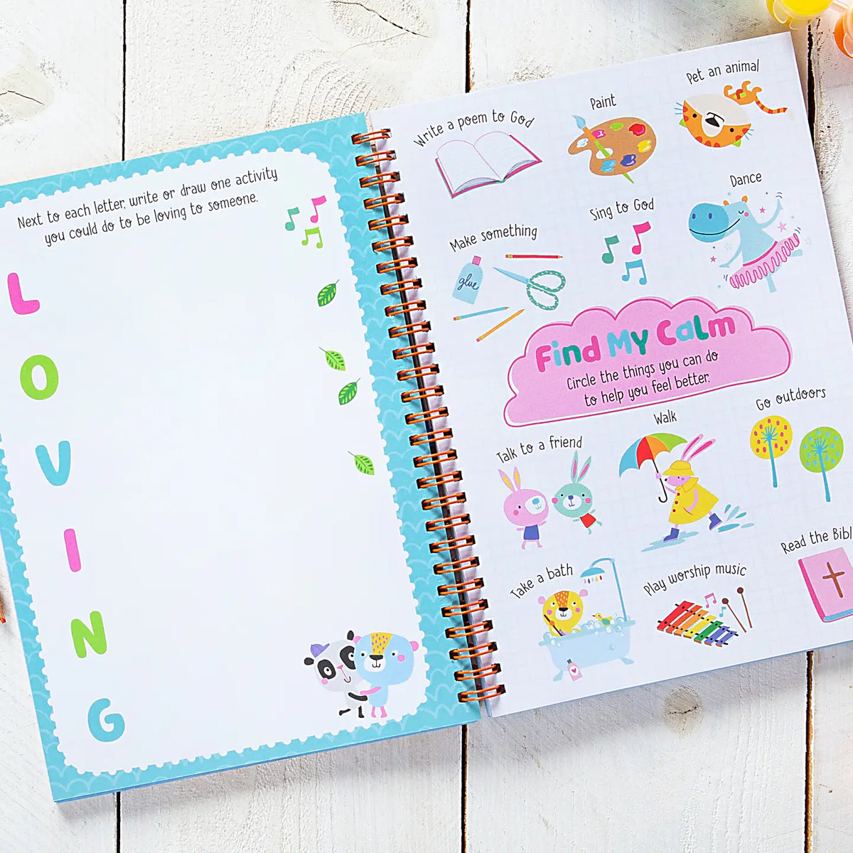 Kids spiral notebook journal open to “Find My Calm” animal themed activities page
