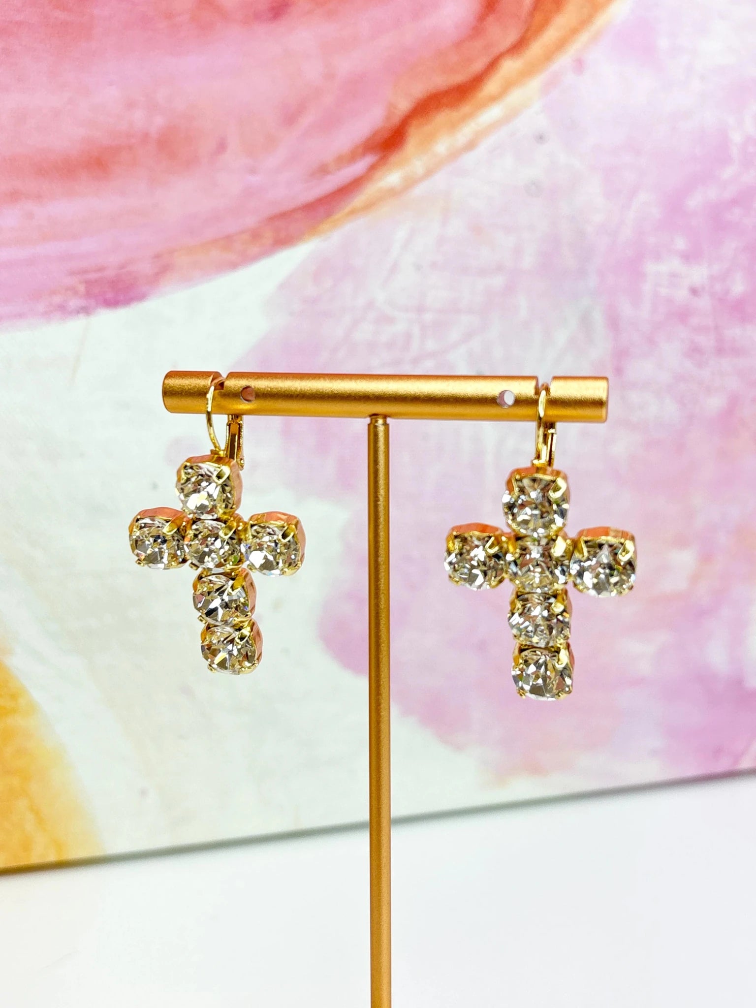 Sparkling cross earrings with pave stones