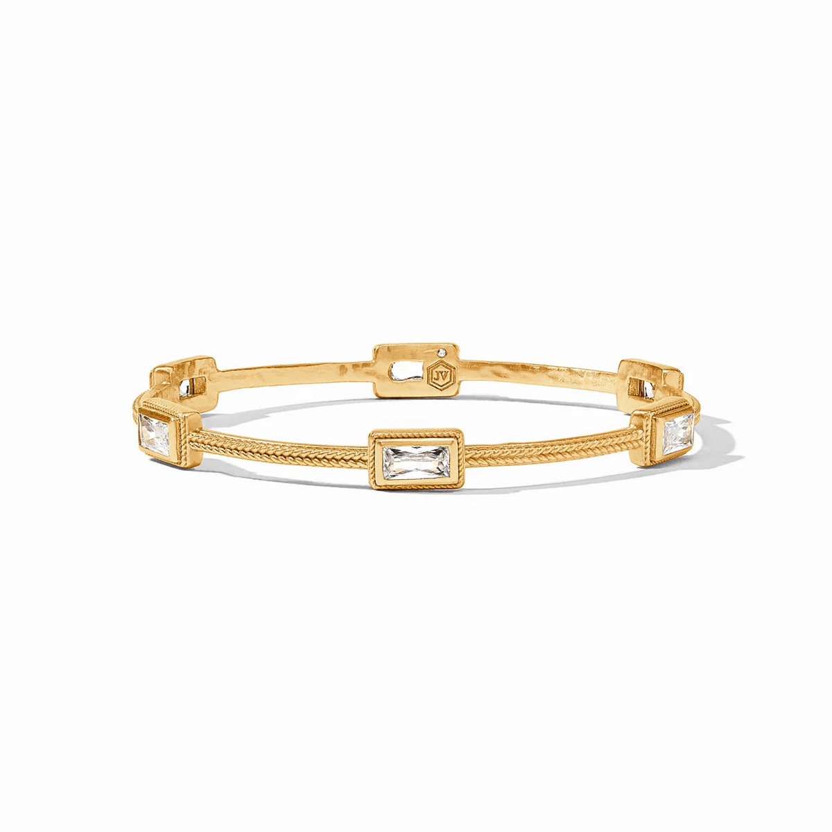 Small gold bangle set with baguette cut cubic zirconia