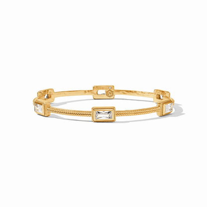 Small gold bangle set with baguette cut cubic zirconia