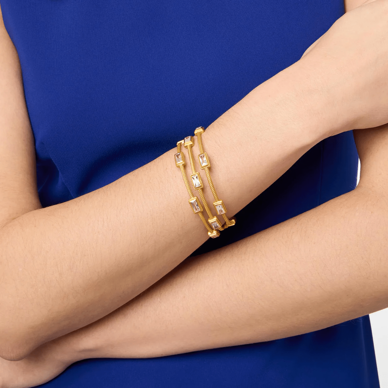 Baguette stone bangle in polished gold