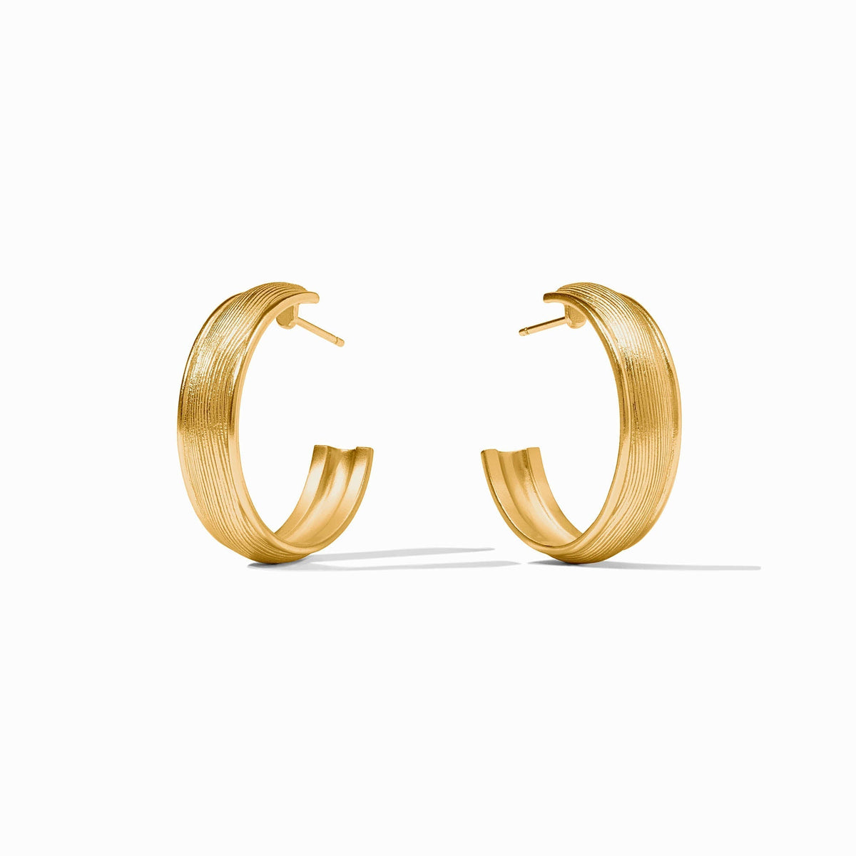 Gold hoops with a pebbled cobblestone finish