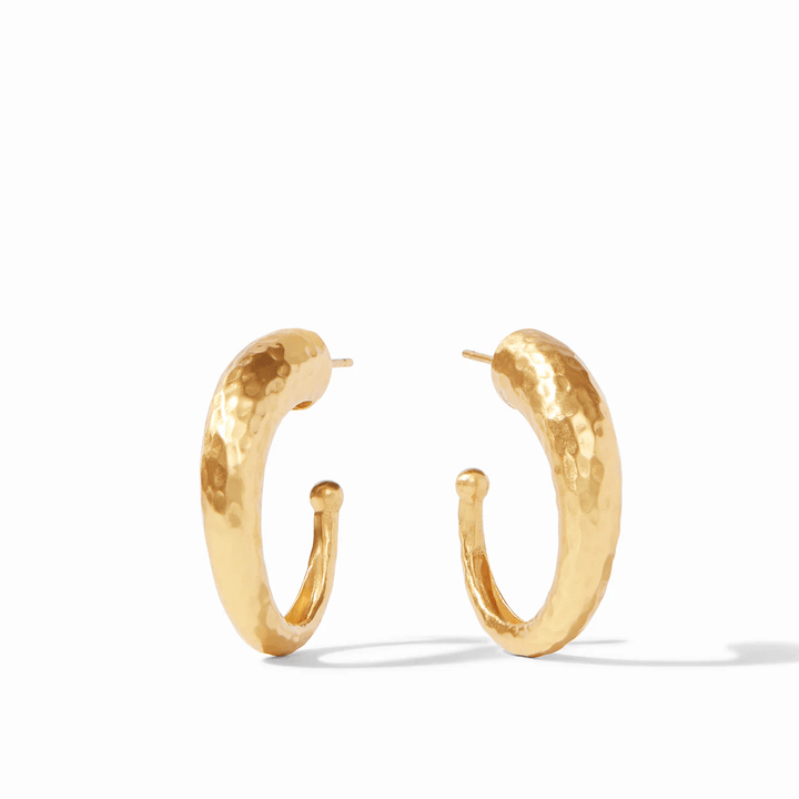 Medium gold hoops with a hammered finish