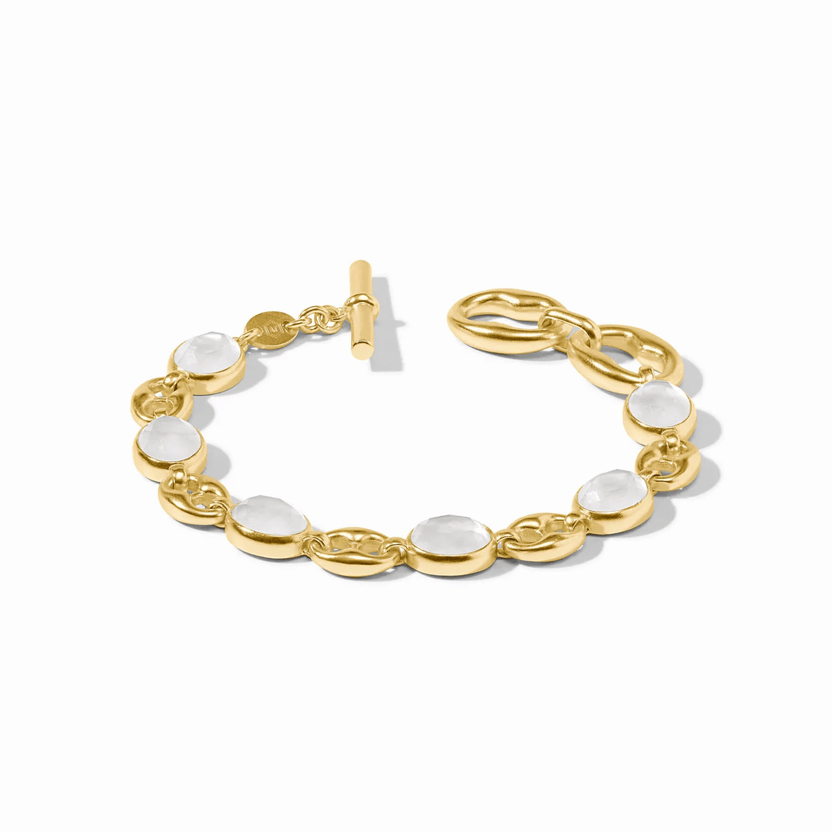 Gold bracelet centered on a polished stone