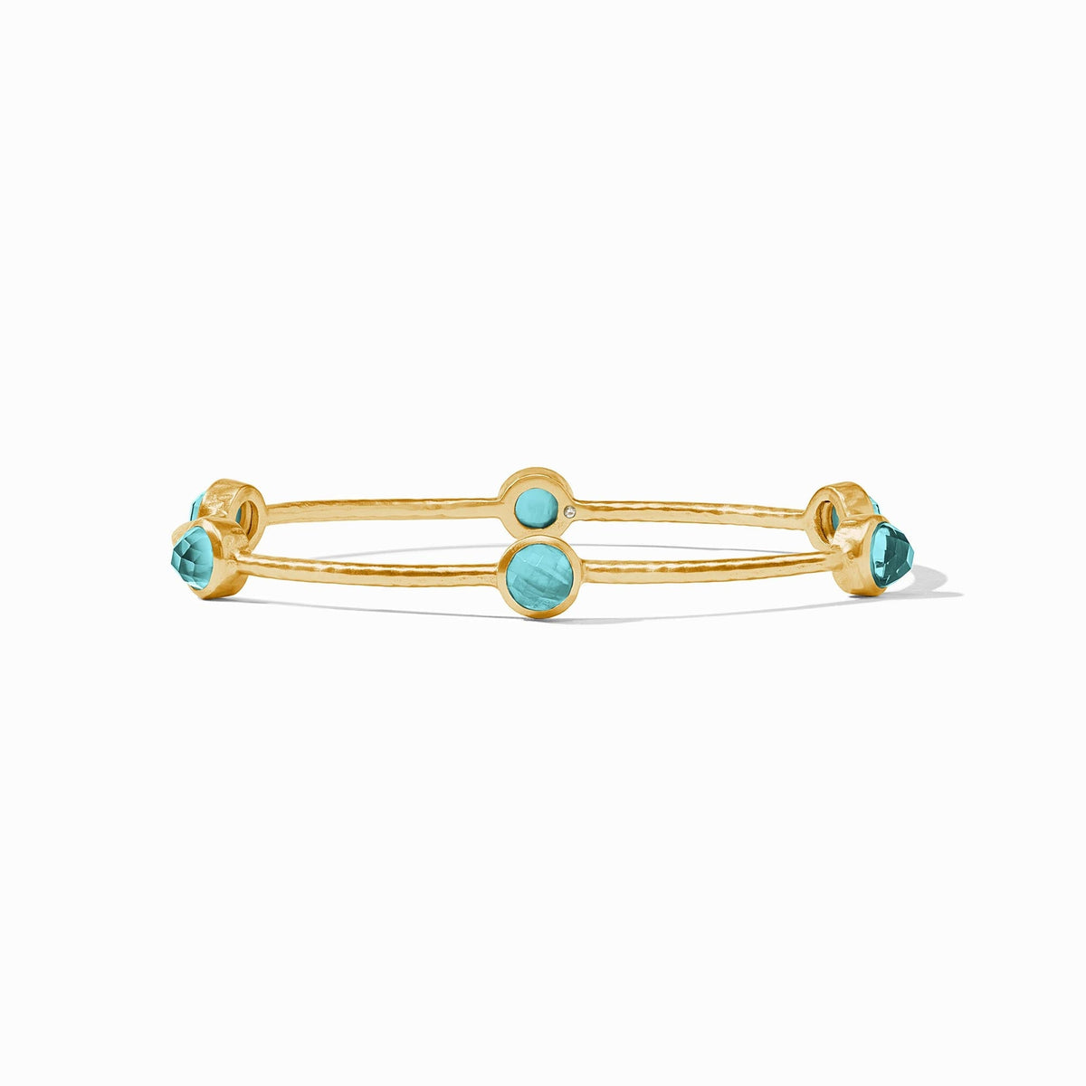 Gold luxe bangle set with a single colored stone