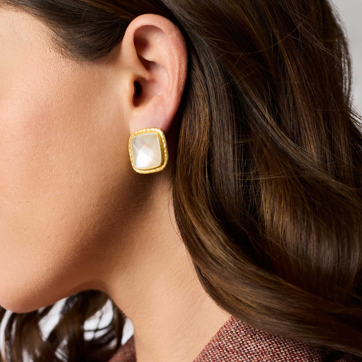 Iridescent clear crystal stud earrings in gold settings