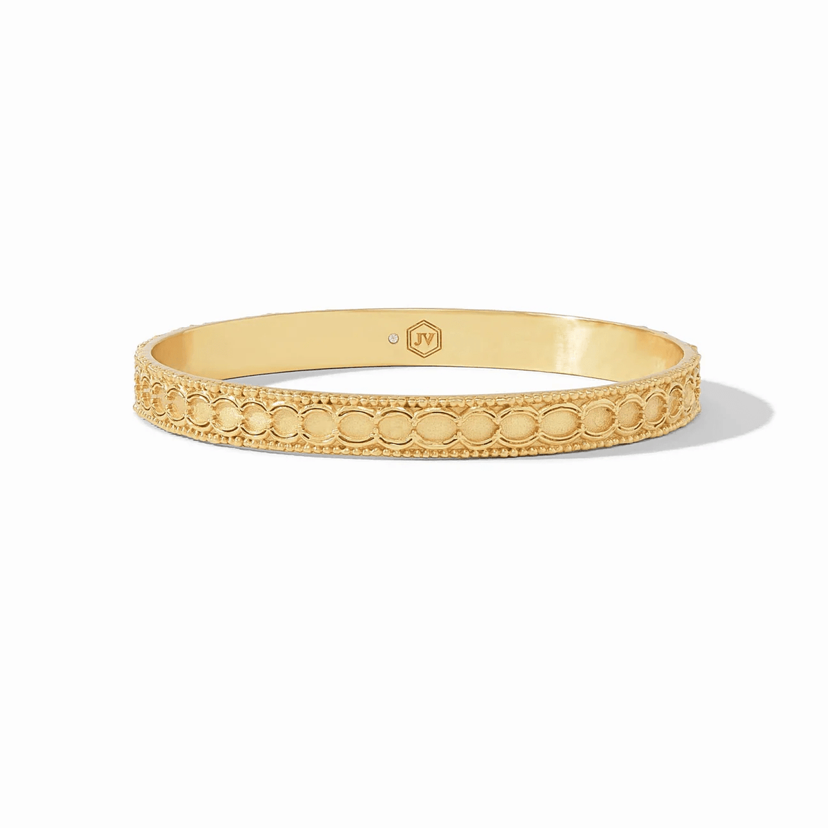 Medium gold bangle with a textured band