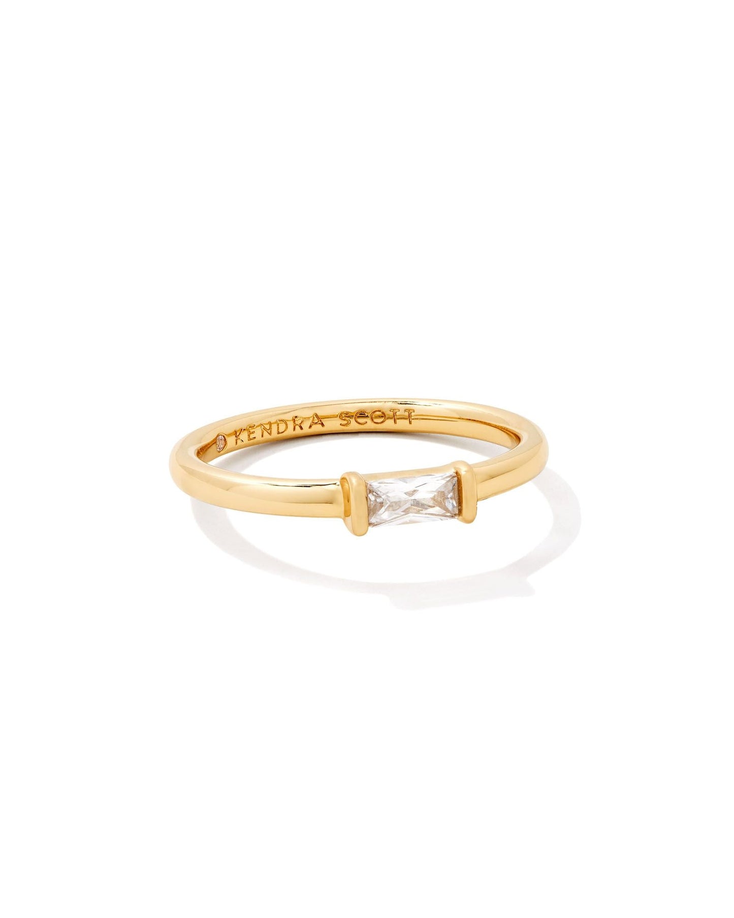 Gold band ring with an engraved pattern