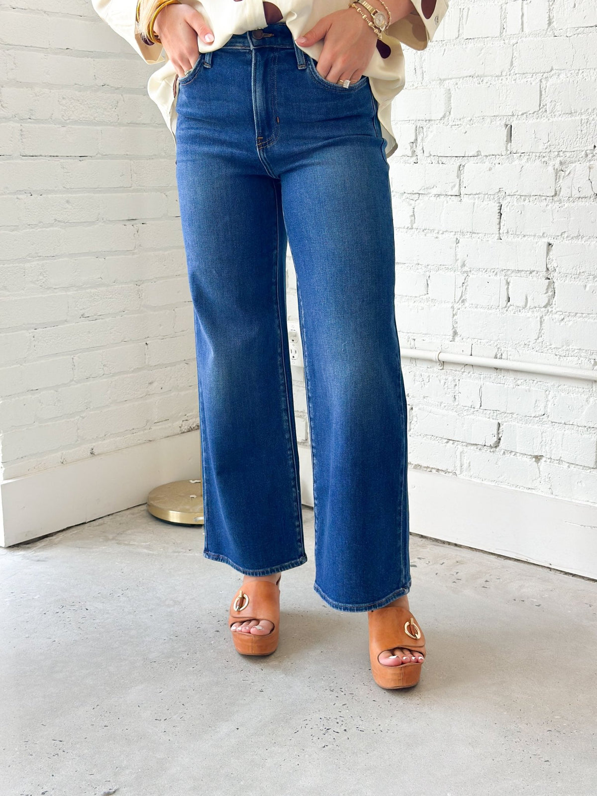 Dark denim wide leg jeans with a high waist