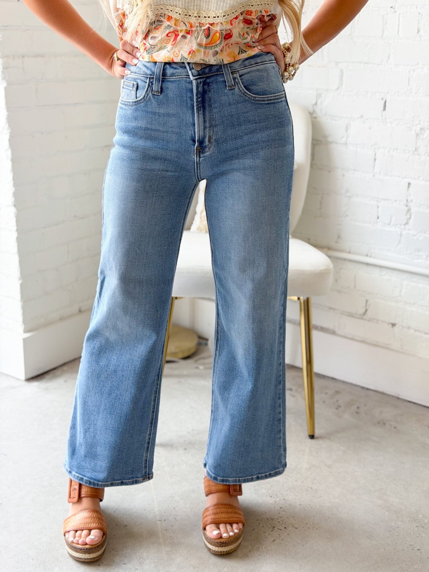 Medium wash high rise wide leg jeans