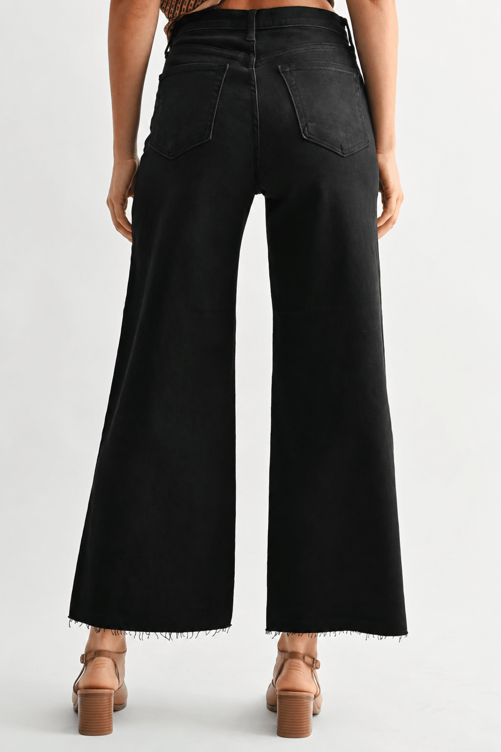 Scissor cut wide leg denim with a frayed hem