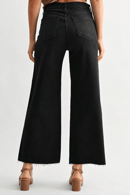 Scissor cut wide leg denim with a frayed hem