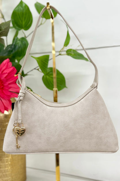 Cement grey shoulder purse with a heart locket clasp