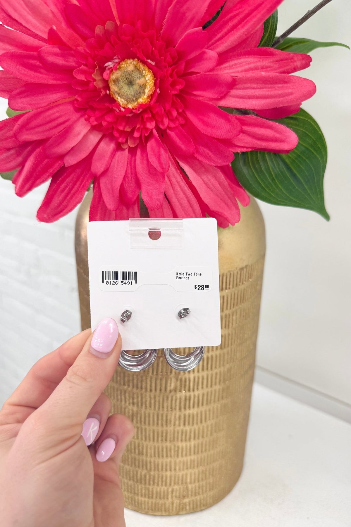 Earrings combining gold and silver tones