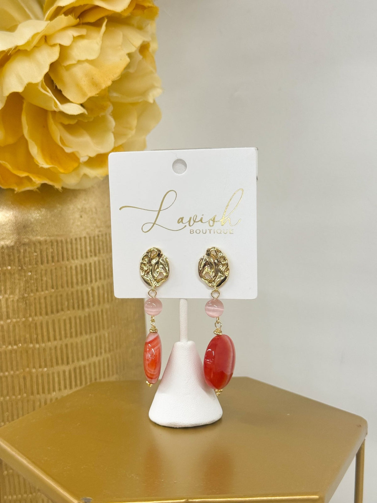 Gold drop earrings with beaded stations and round pendants