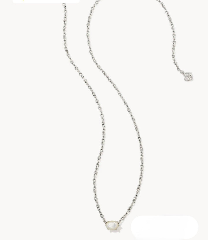 Gold necklace with an ivory stone pendant