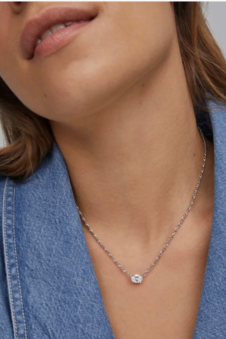 Clear cubic zirconia drop on a rhodium chain