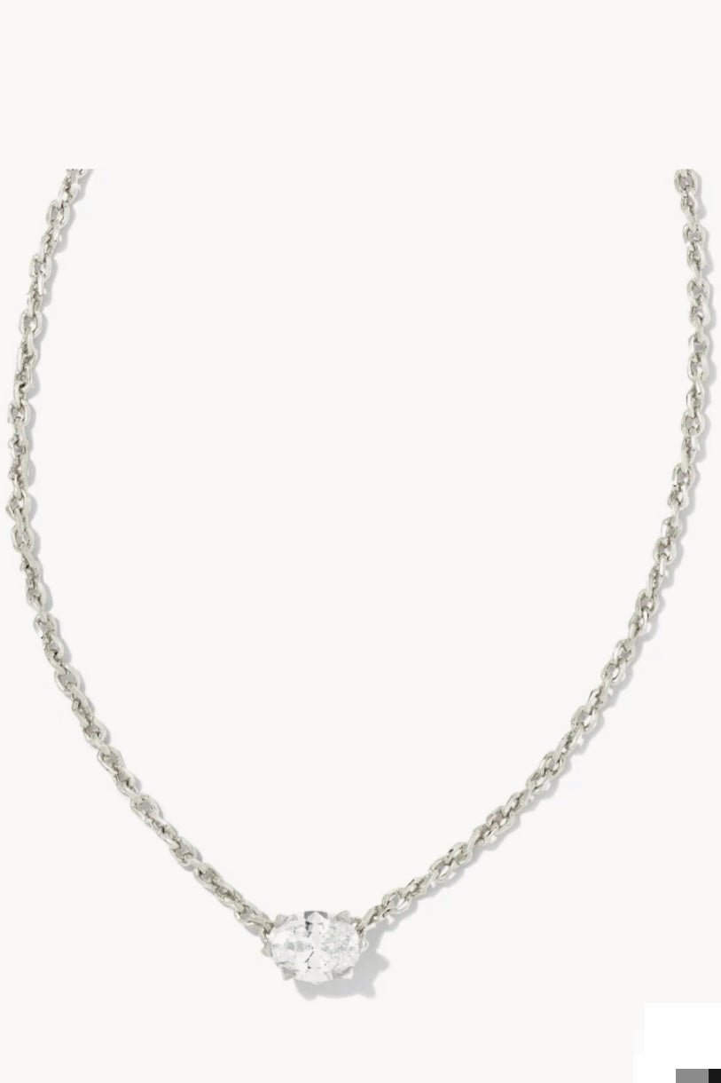 Silver-tone necklace with a faceted clear pendant