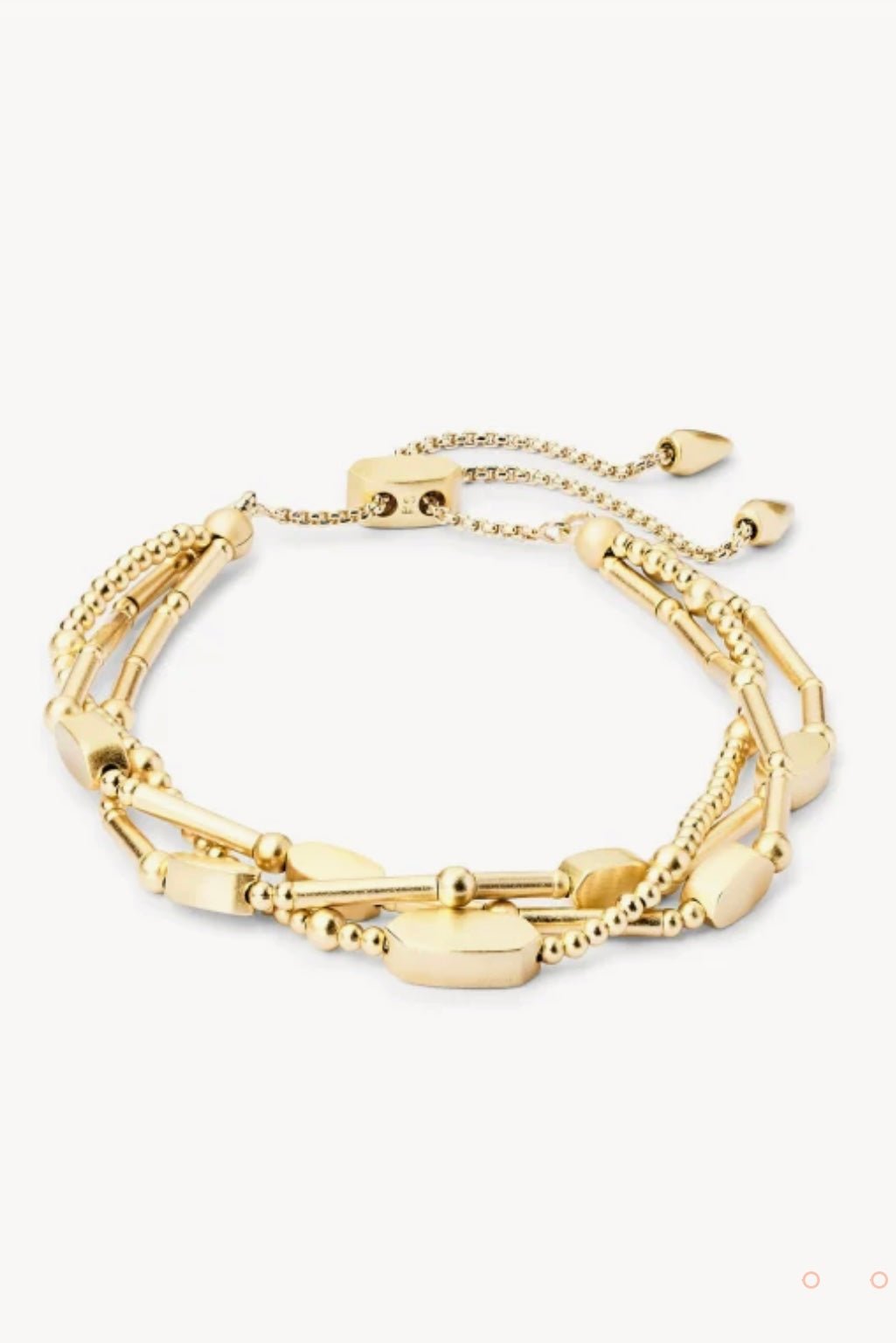 Delicate gold bracelet with bead stations