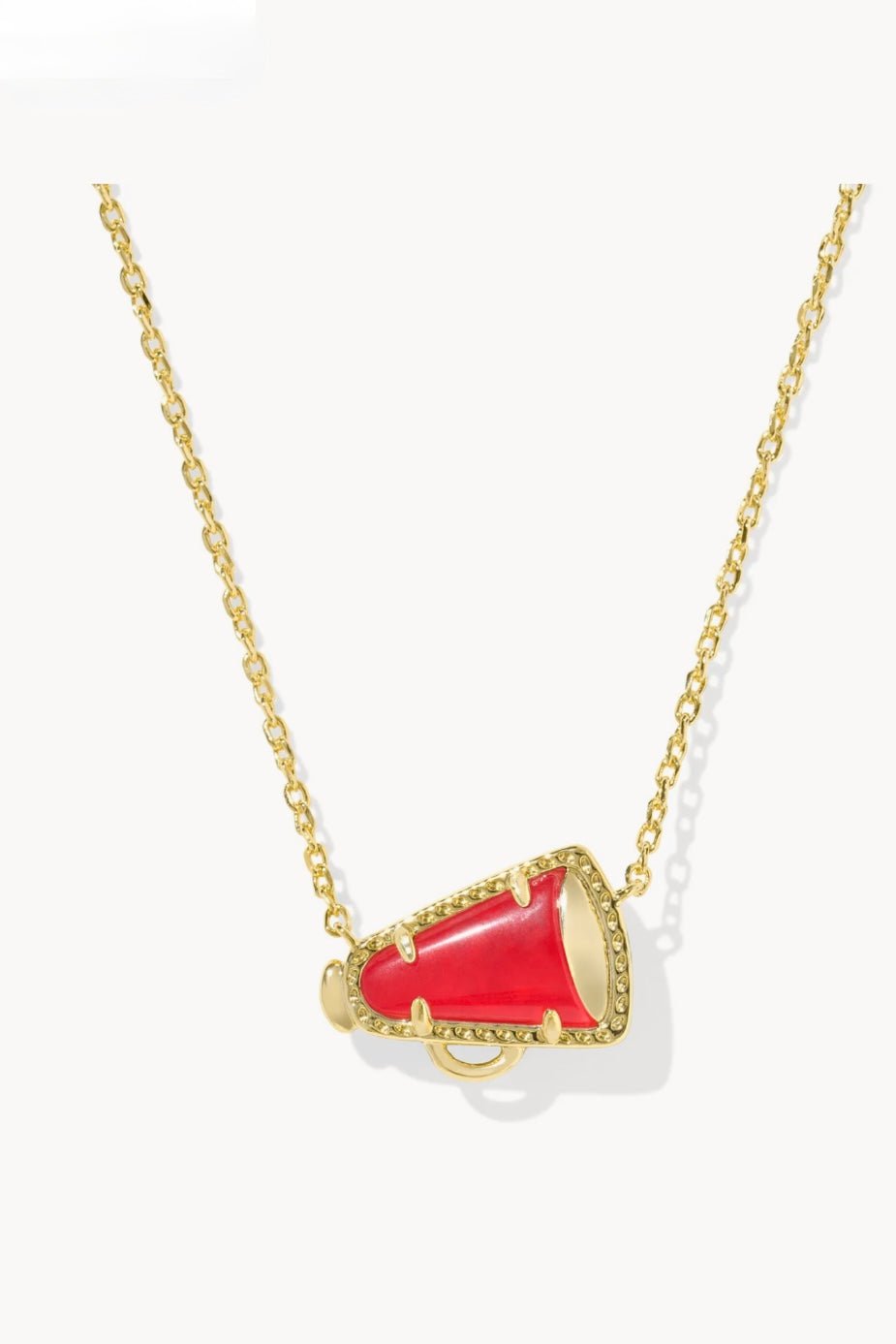 Red stone cheer pendant on a gold chain