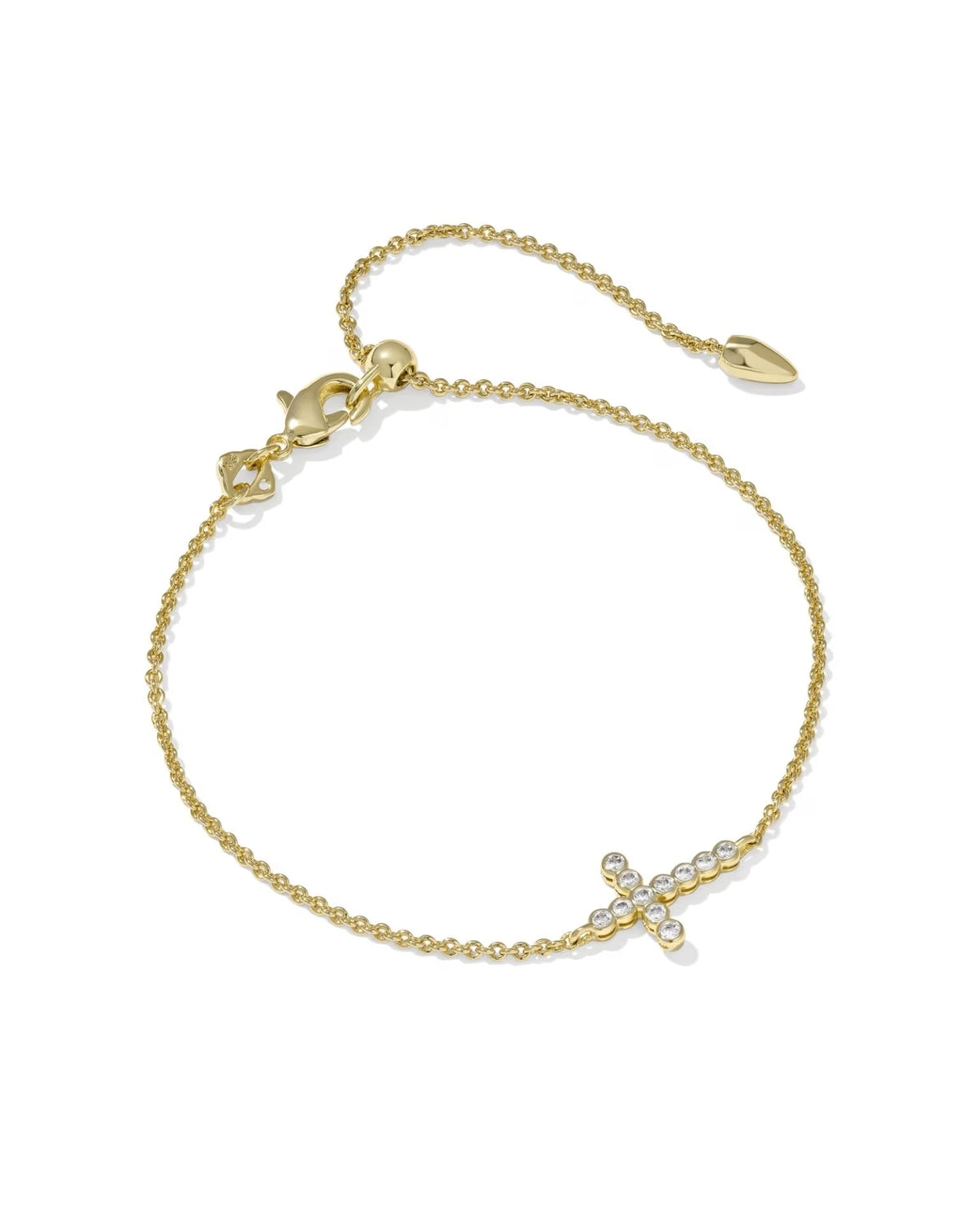Delicate gold bracelet with a crystal cross