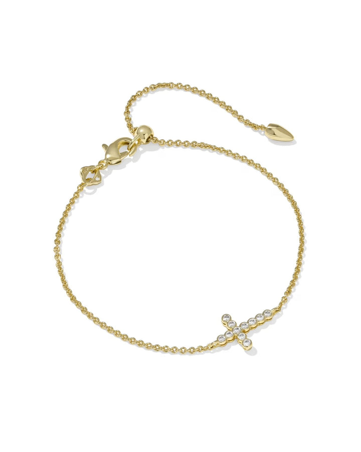 Delicate gold bracelet with a crystal cross
