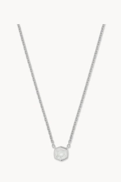 Silver necklace with a clear rock crystal drop