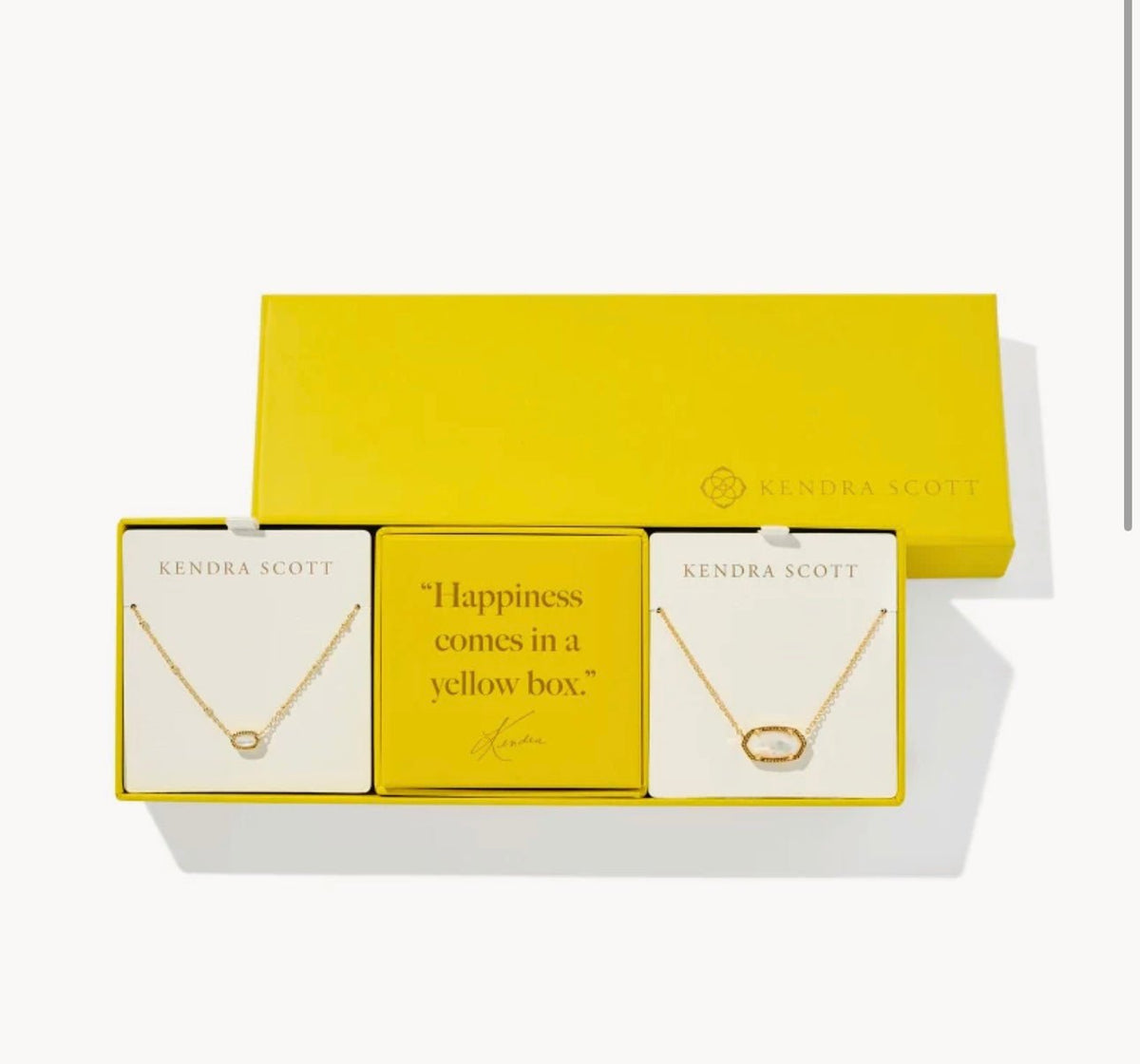 Gold gift set with two ivory mother of pearl pieces