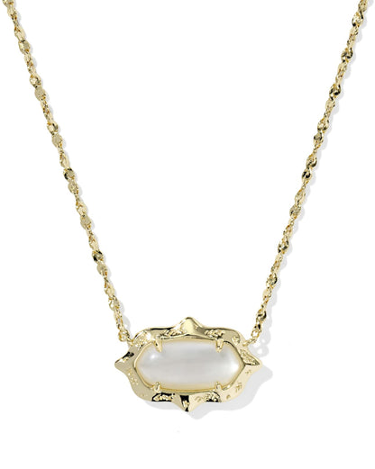 Scalloped stone pendant on a gold chain