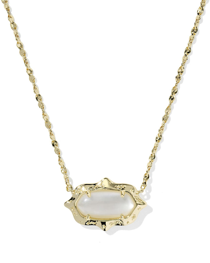 Scalloped stone pendant on a gold chain