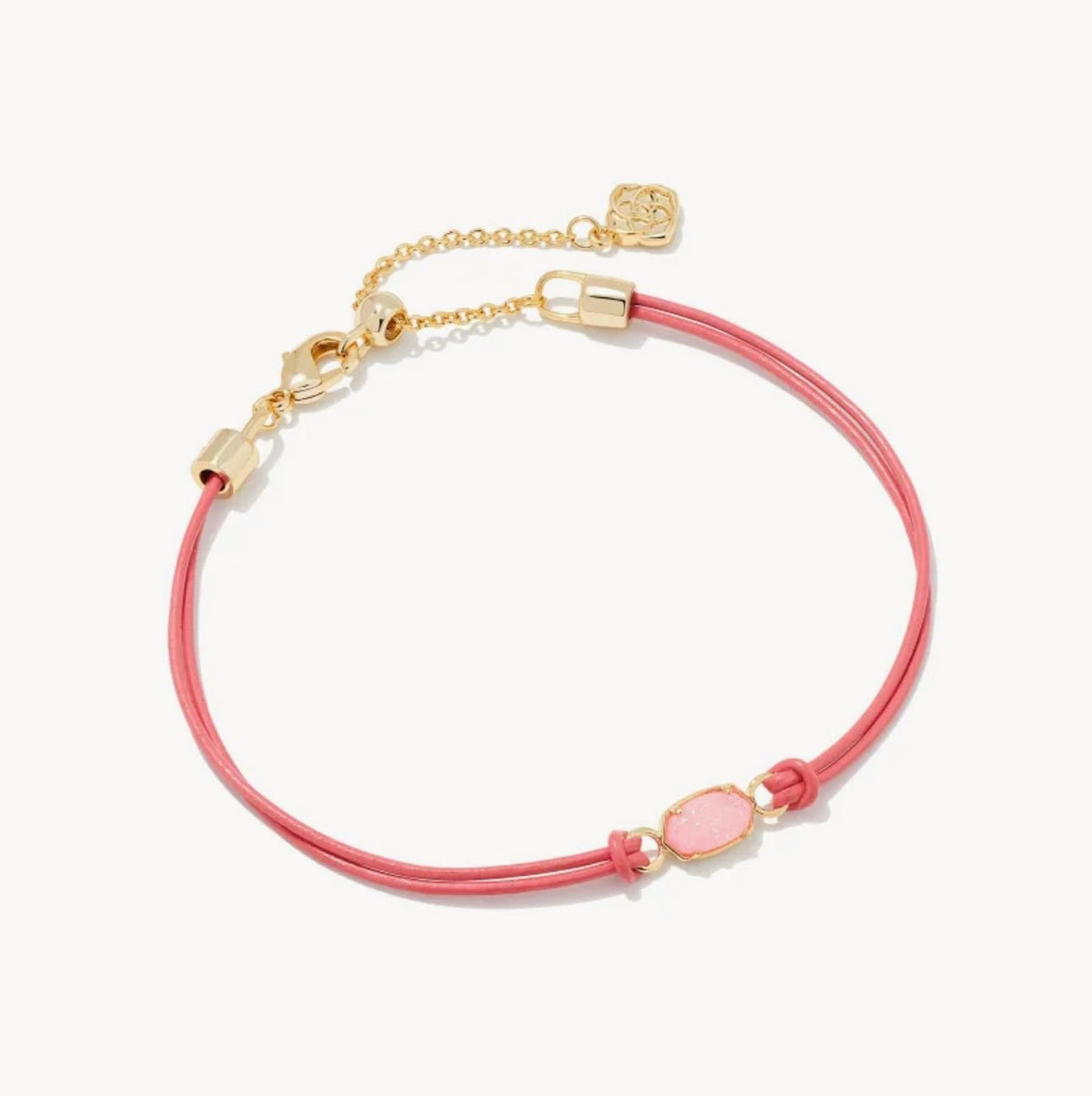 Gold corded bracelet with a light pink drusy stone