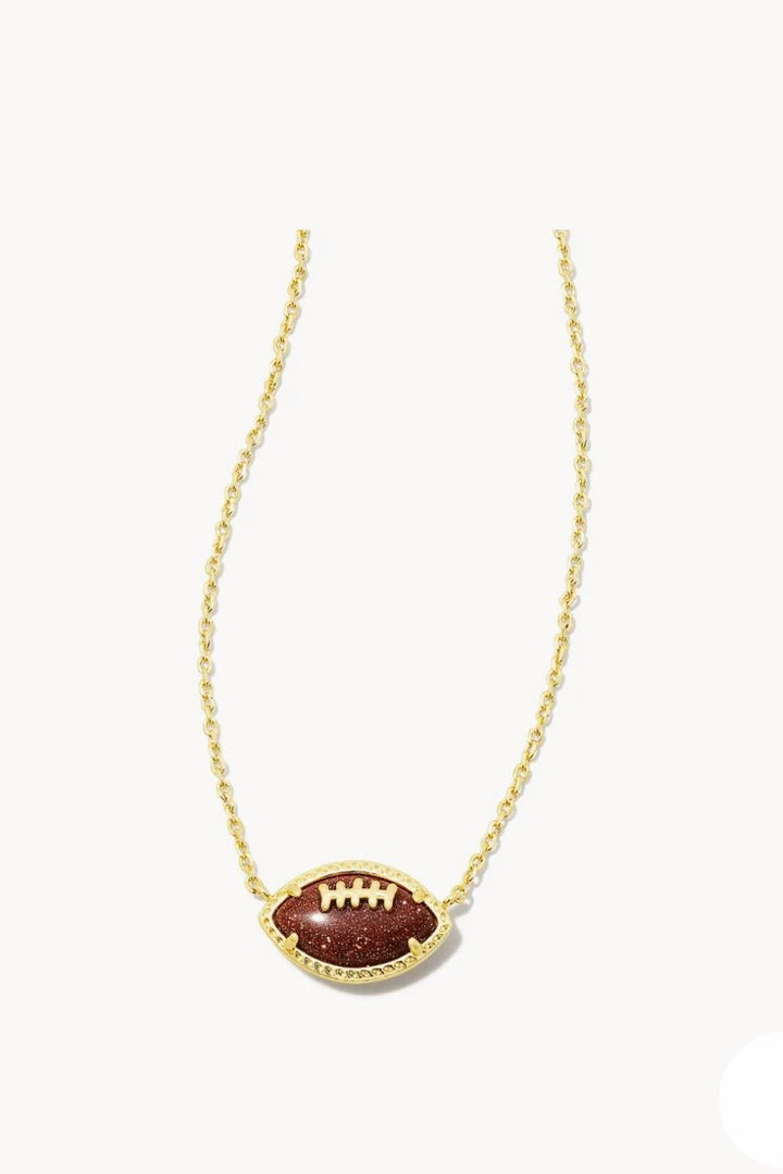 Gold short necklace with an orange football pendant