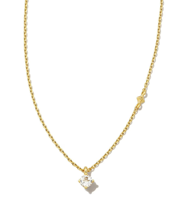 Gold pendant necklace with a white topaz stone