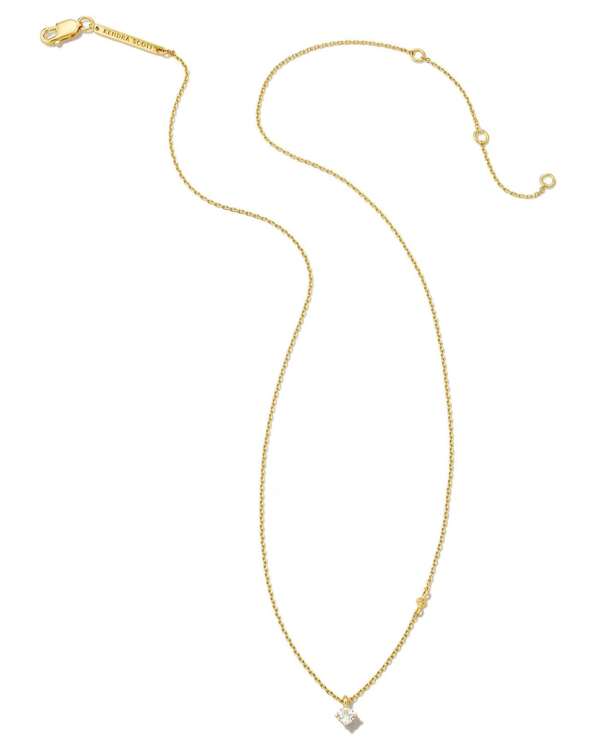 White topaz drop on a gold chain necklace