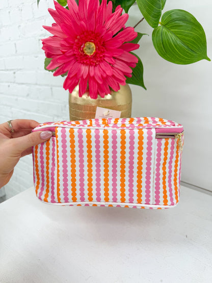 Striped Kiss and Makeup pouch in the Sunstripe design